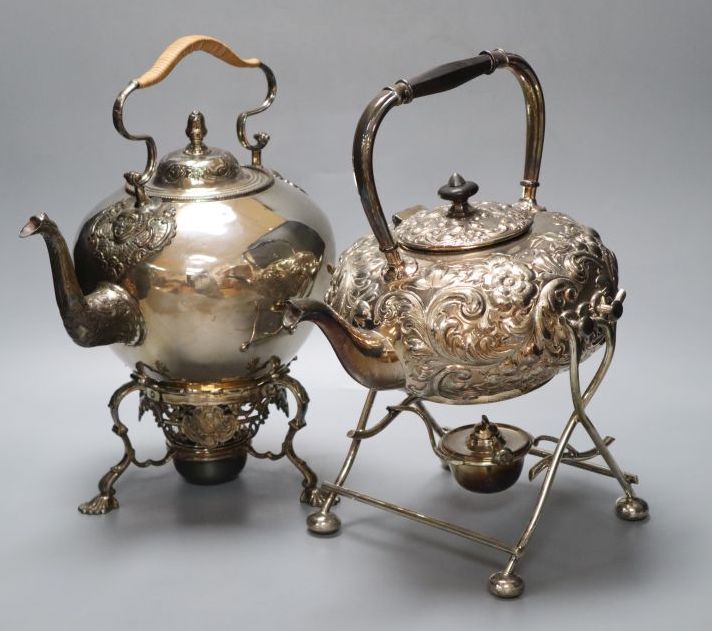 Two Victorian silver plated tea kettles each on burner stands, 34cm high